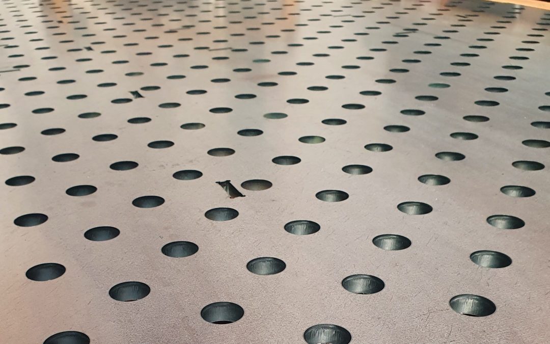 What makes Laser Expertise a leading laser cutting company?